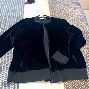 Lush black velour light jacket that pairs well with jeans or slacks
